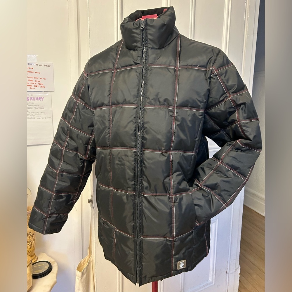 Black Puffer Jacket with Red and White Topstitching